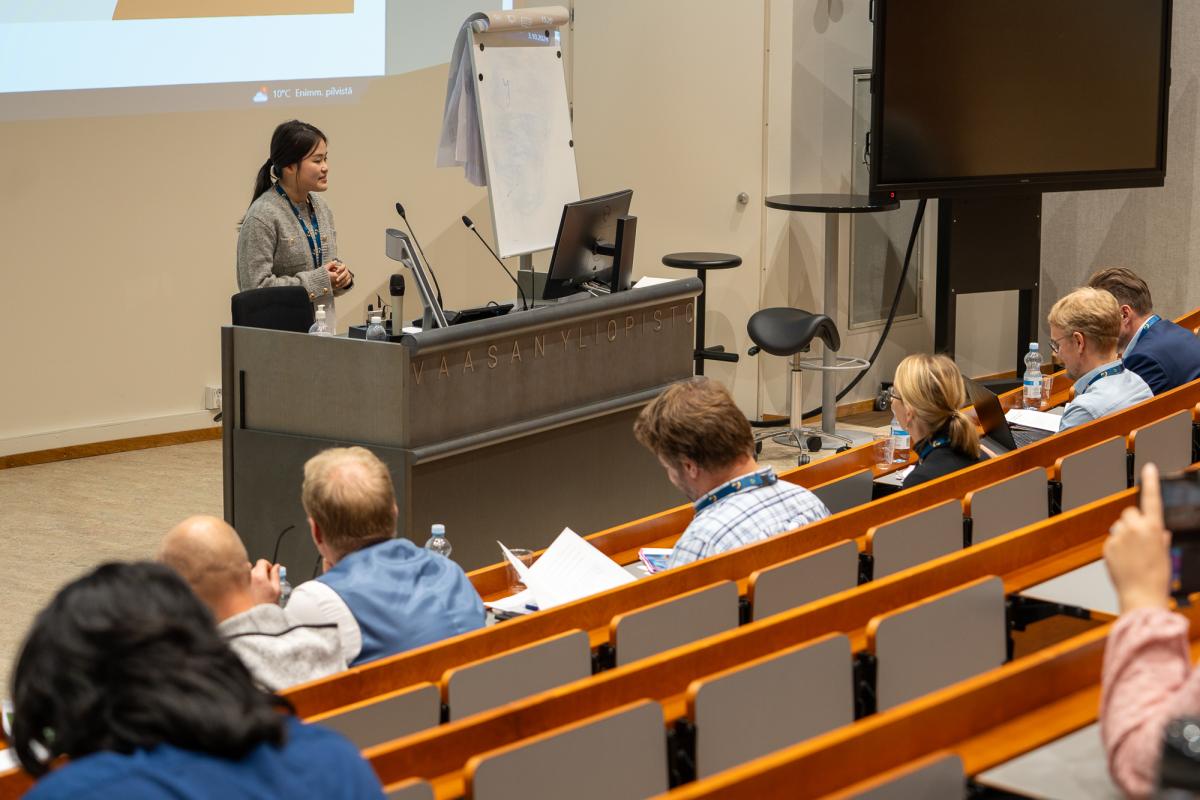 Student presenting for an audience